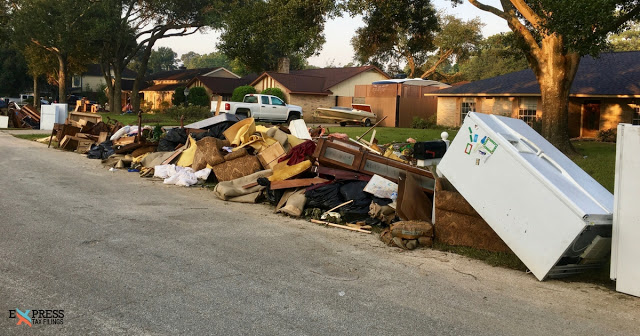 A Mound of Peoples Belongings and Possessions Destroyed  